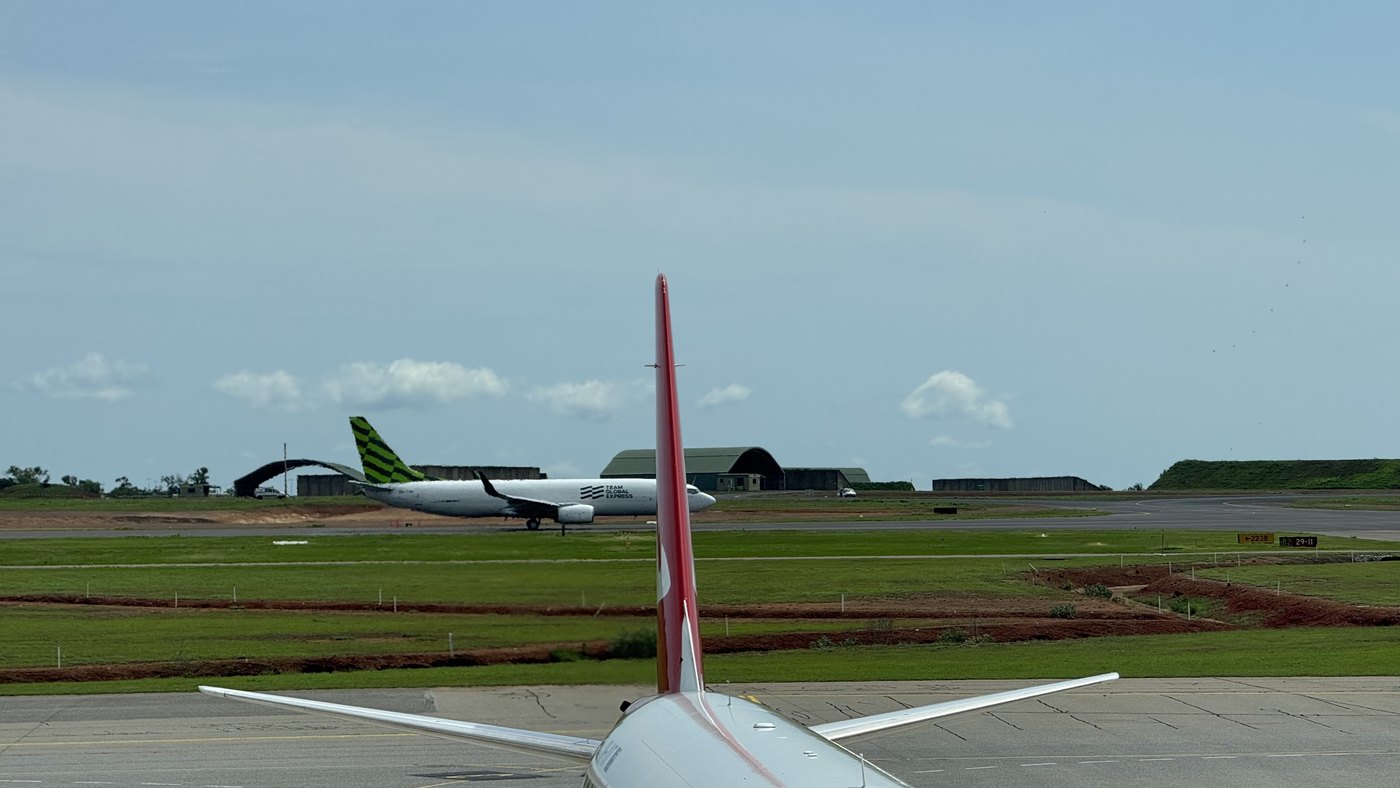 Aircraft tail at a green island airstrip